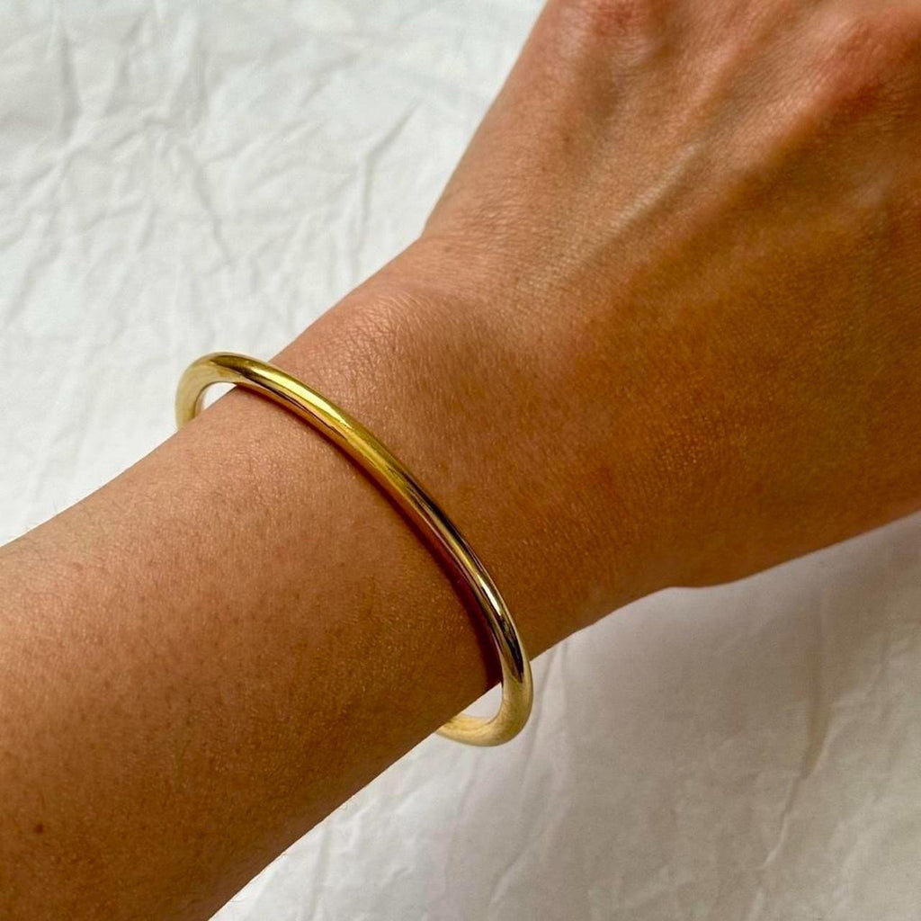 Gold open bangle