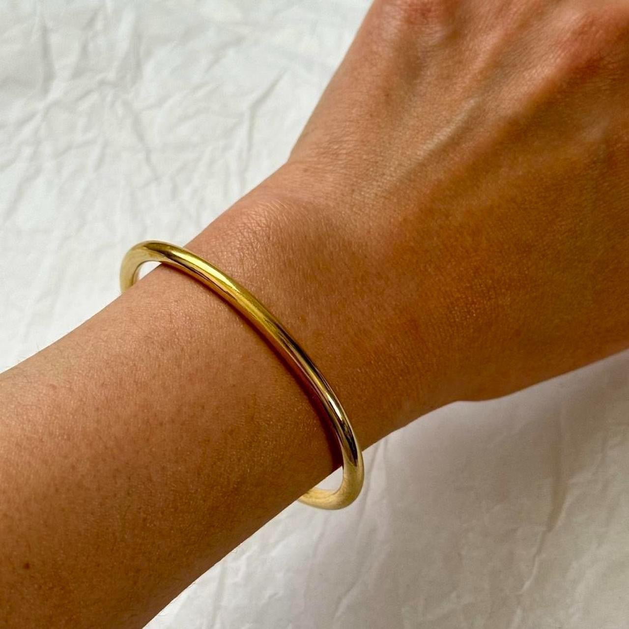 Gold open bangle
