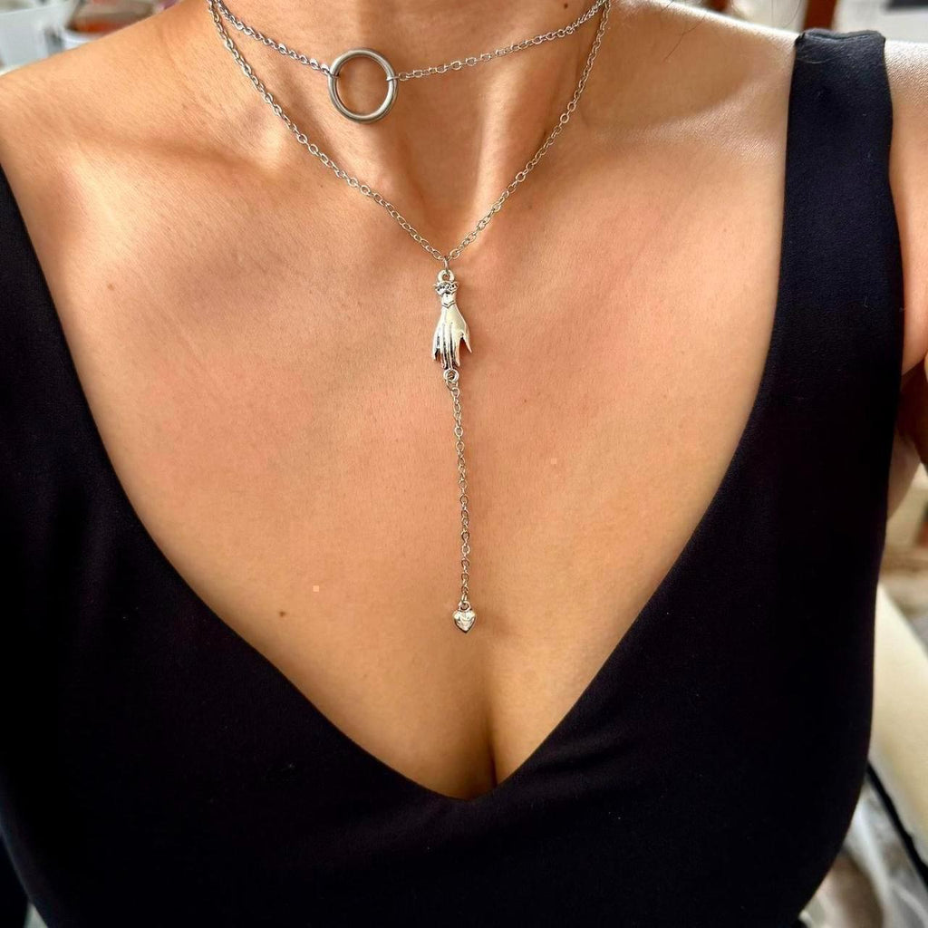 Hand with heart drop lariat necklace